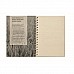 Quaderno A5 con spirale e fogli di carta in erba